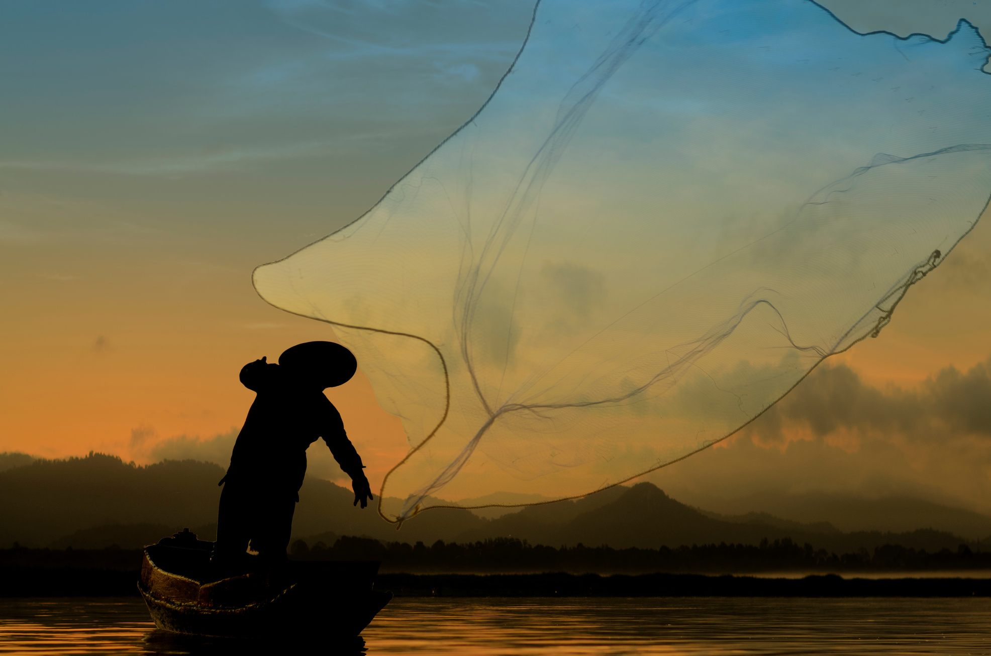 Fisherman in action when cast a net